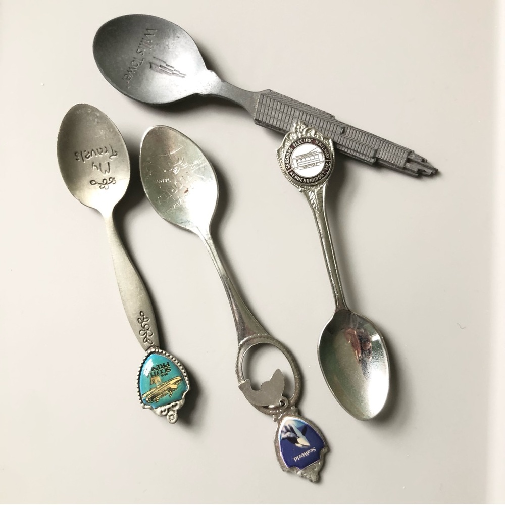 Collection of Four Vintage Previously Owned Silver Decorative Souvenir Spoons